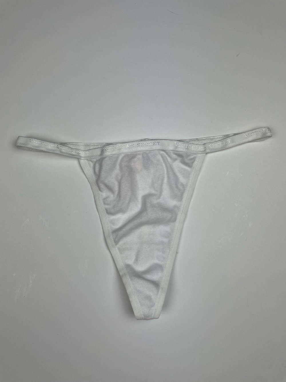 NWT Victoria's Secret white v-string thong with logo along the waistband